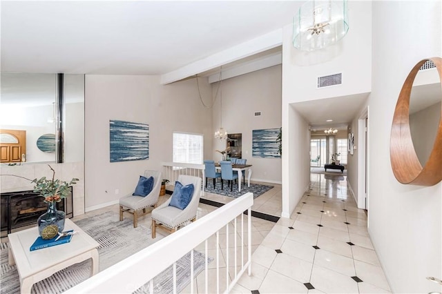 interior space featuring a chandelier and lofted ceiling