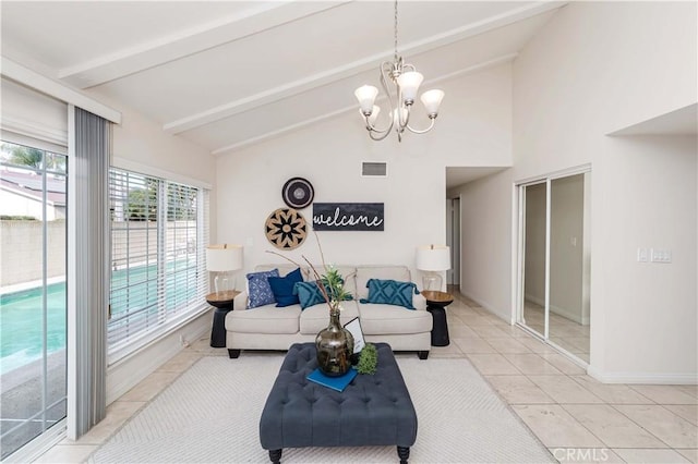 tiled living room with a chandelier and vaulted ceiling with beams