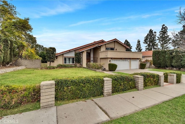 view of front of home featuring a balcony and a front lawn