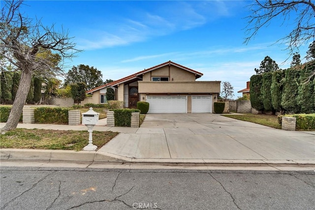 view of front of property with a garage