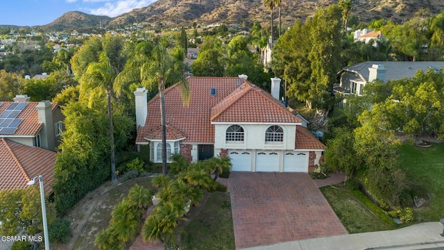 aerial view featuring a mountain view