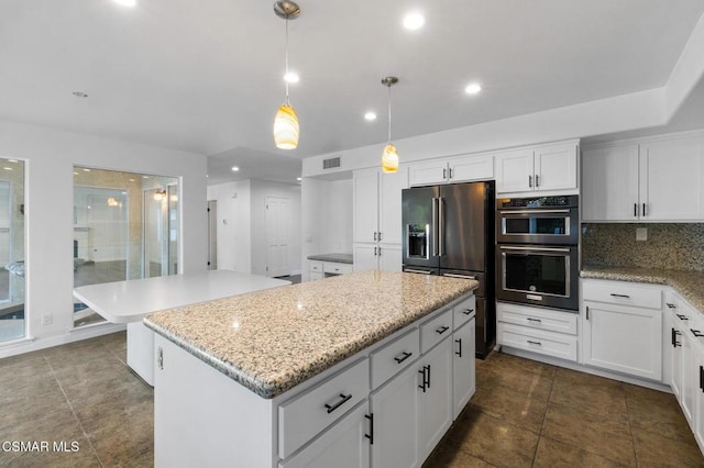 kitchen with white cabinetry, high end refrigerator, hanging light fixtures, double wall oven, and a center island