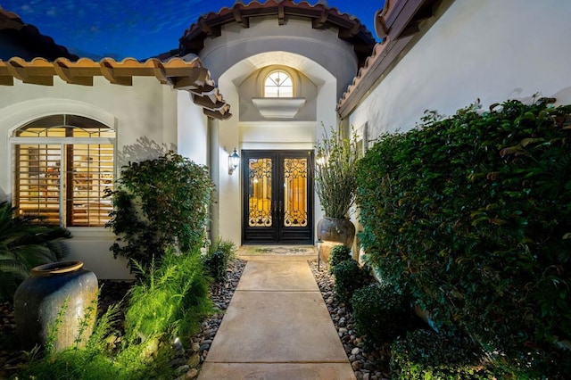 view of exterior entry with french doors