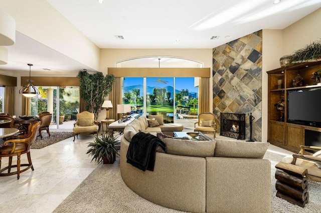 living room featuring a fireplace