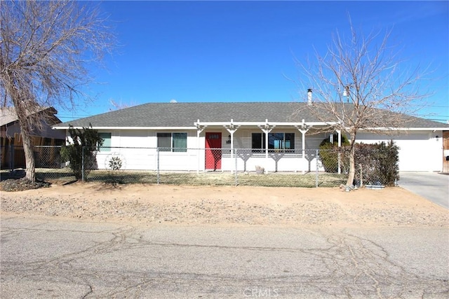 ranch-style home featuring a garage