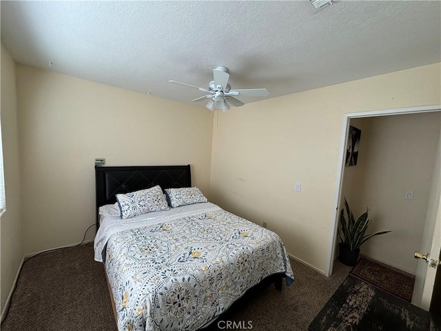 bedroom with ceiling fan and carpet floors