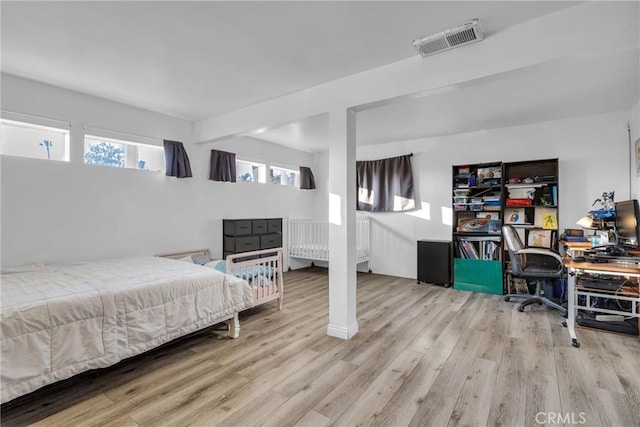 bedroom featuring light hardwood / wood-style floors