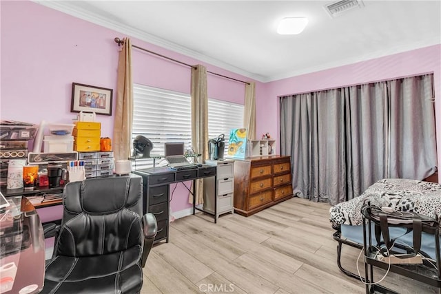 office space featuring crown molding and light wood-type flooring