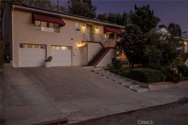 view of front of property featuring a garage