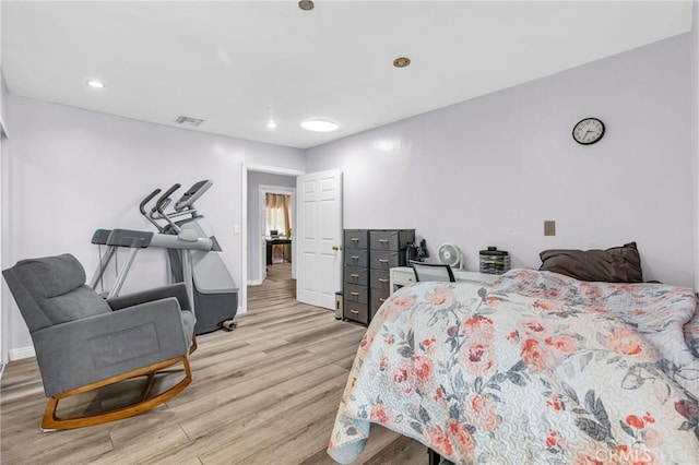 bedroom featuring light wood-type flooring