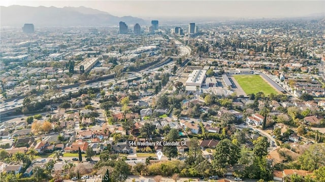 birds eye view of property featuring a mountain view