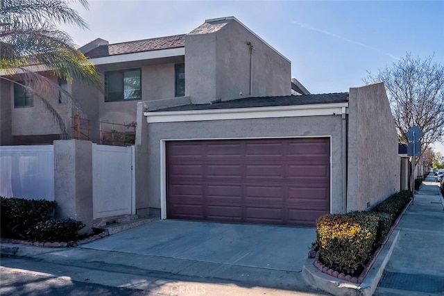 exterior space with a garage