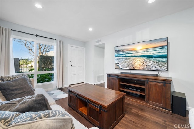 living room featuring dark hardwood / wood-style floors