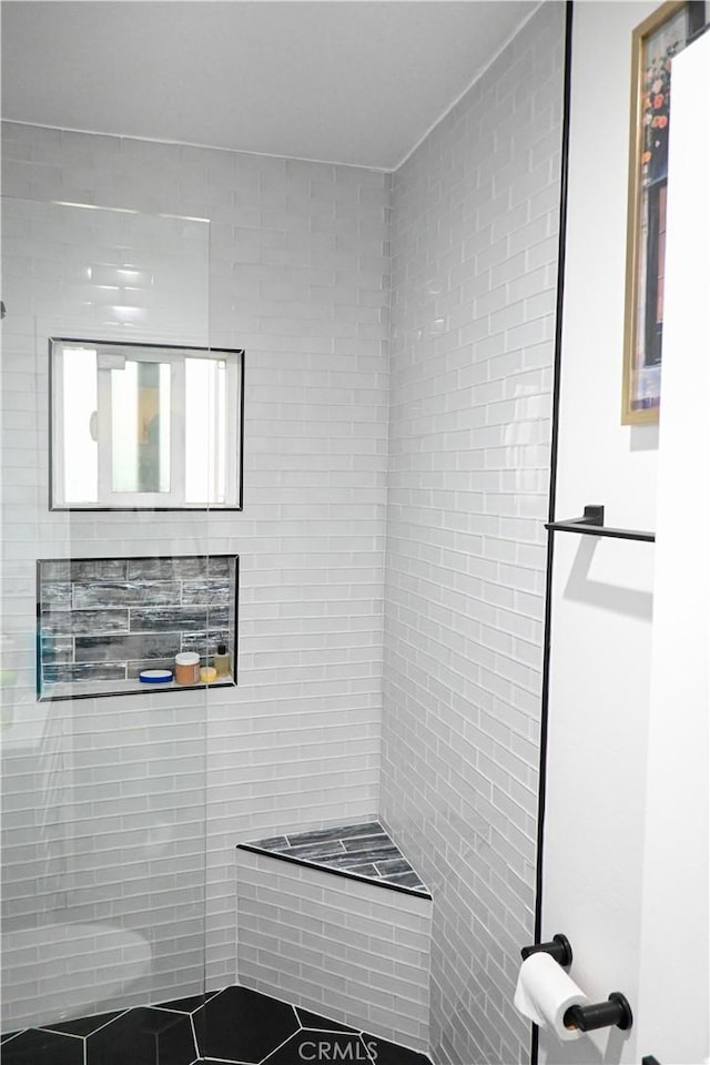 bathroom featuring walk in shower