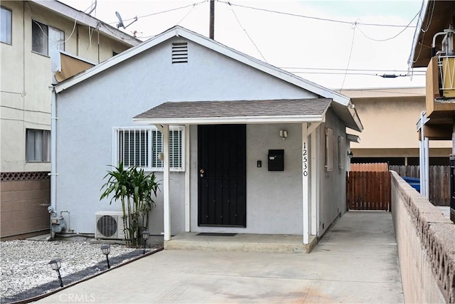 property entrance with ac unit