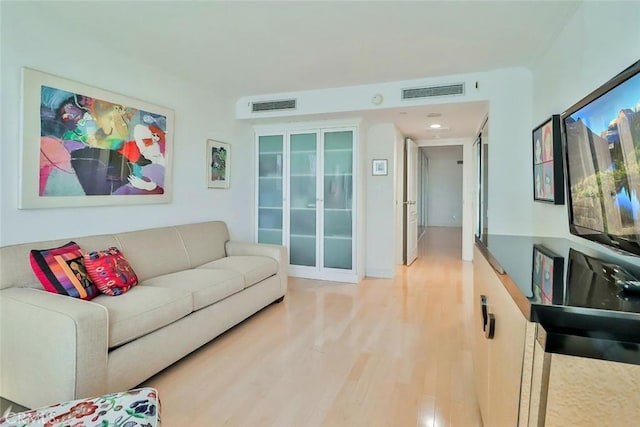 living room with wood-type flooring