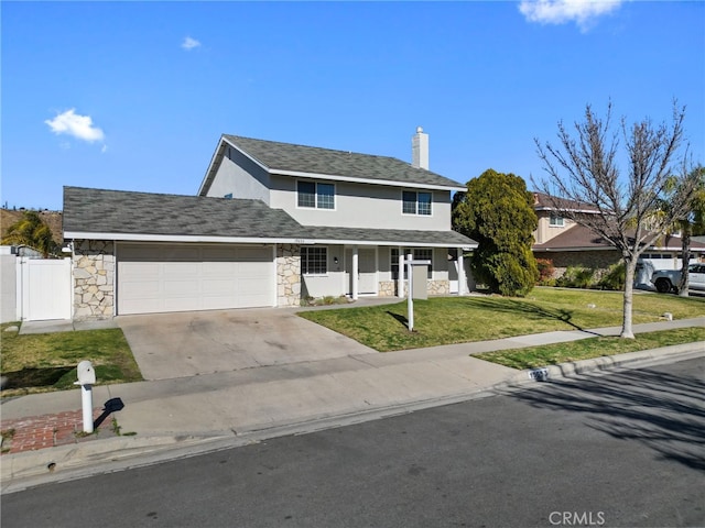 view of front of house with a porch, a garage, and a front yard