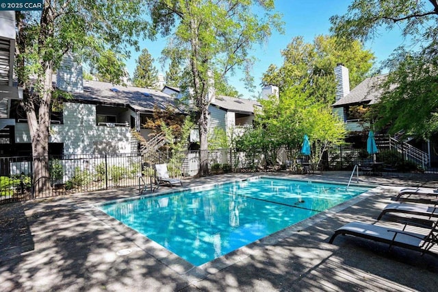 view of pool featuring a patio area