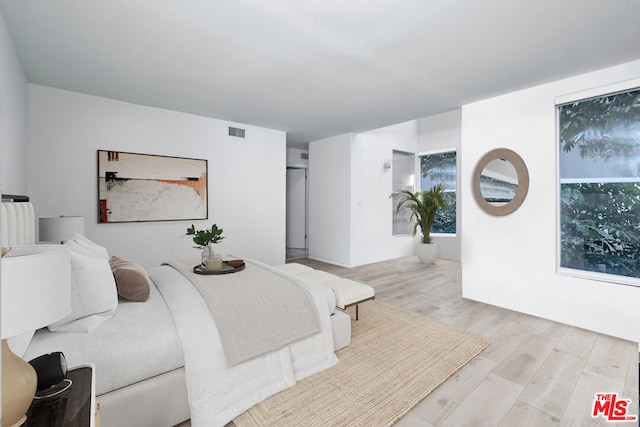 bedroom featuring light hardwood / wood-style flooring