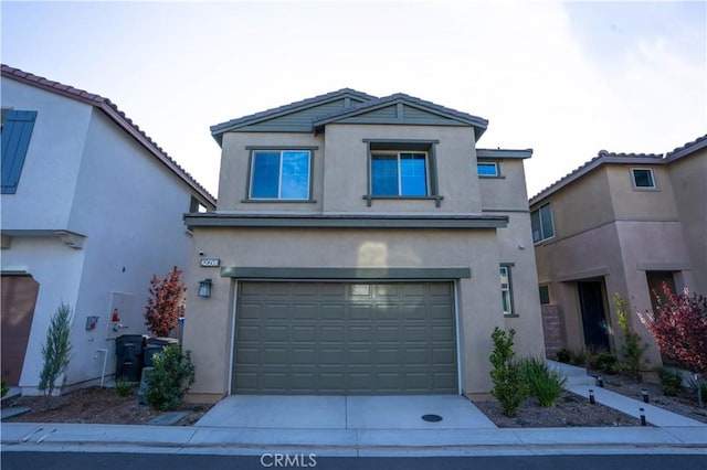 view of front of home with a garage