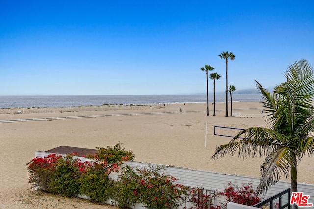 view of water feature with a beach view