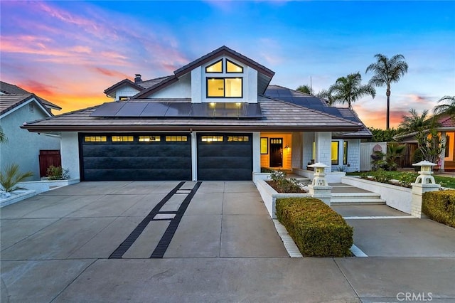 view of front of house with solar panels