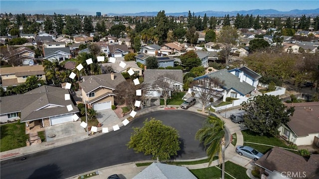 drone / aerial view featuring a mountain view