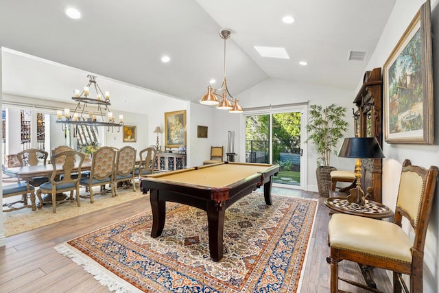 playroom with a chandelier, wood-type flooring, pool table, and vaulted ceiling with skylight