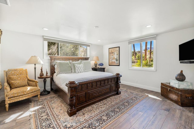 bedroom featuring hardwood / wood-style flooring