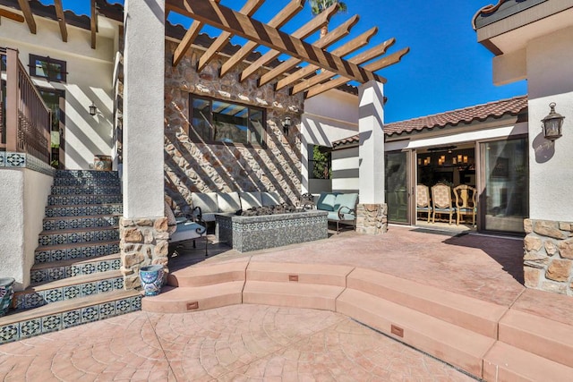 view of patio / terrace featuring an outdoor living space and a pergola