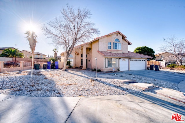 view of front of home with a garage