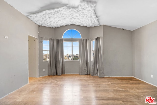 empty room featuring hardwood / wood-style floors