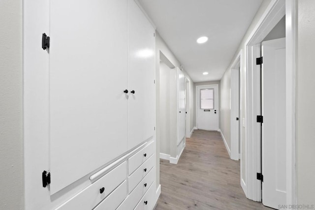 hall featuring light hardwood / wood-style flooring