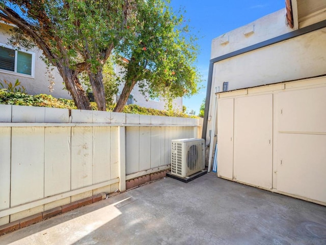 view of patio / terrace featuring ac unit