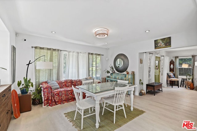 dining space featuring light hardwood / wood-style flooring