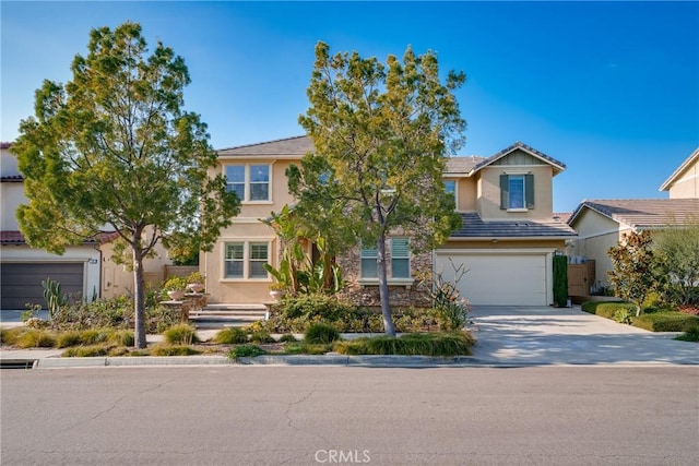 view of front of property featuring a garage