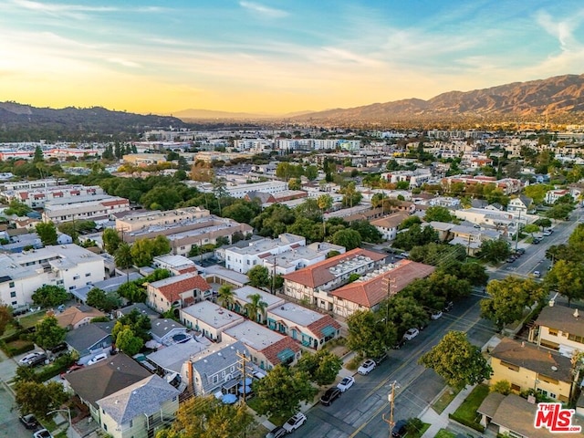 aerial view at dusk with a mountain view