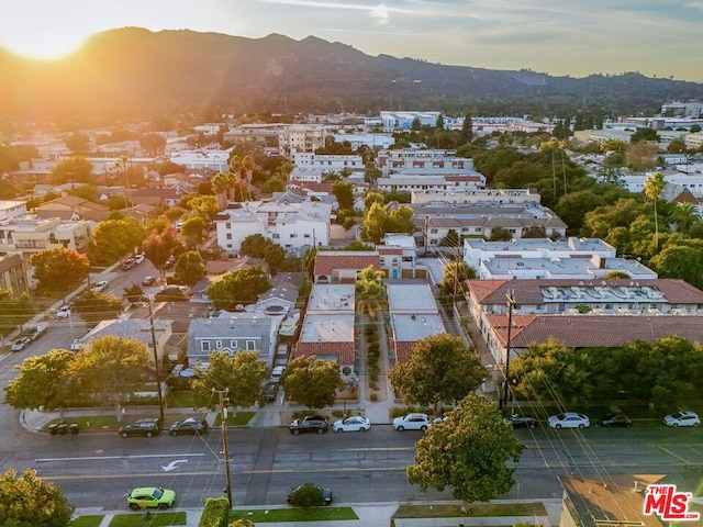 aerial view at dusk with a mountain view