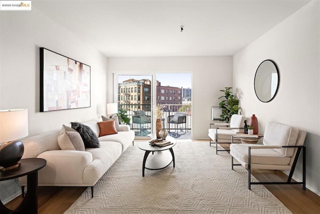 living room with light hardwood / wood-style flooring