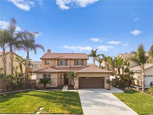 mediterranean / spanish-style house with a garage and a front lawn