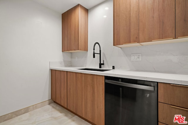 kitchen featuring sink and black dishwasher