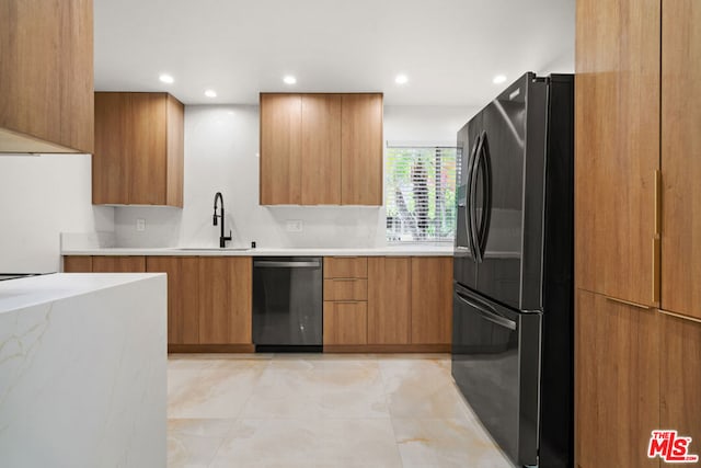 kitchen featuring sink, light tile patterned floors, dishwasher, and black fridge with ice dispenser