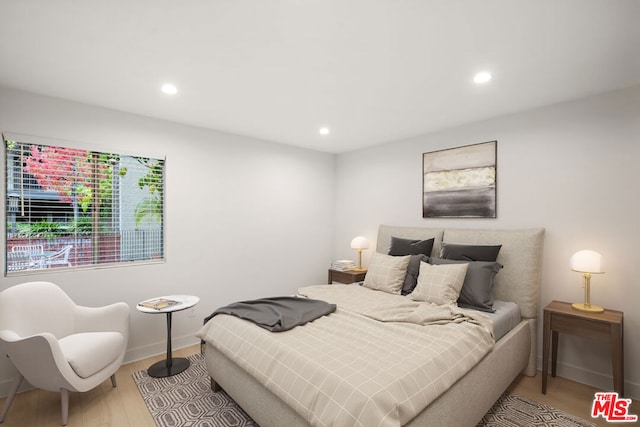 bedroom featuring hardwood / wood-style floors