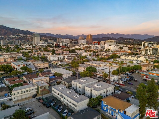 aerial view at dusk with a mountain view