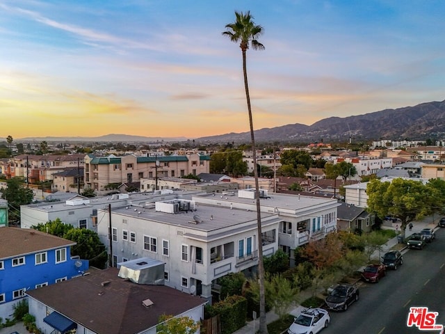 aerial view at dusk with a mountain view