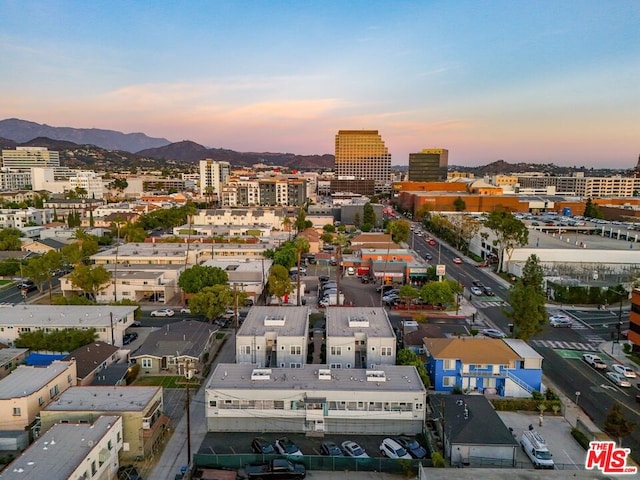 aerial view at dusk with a mountain view