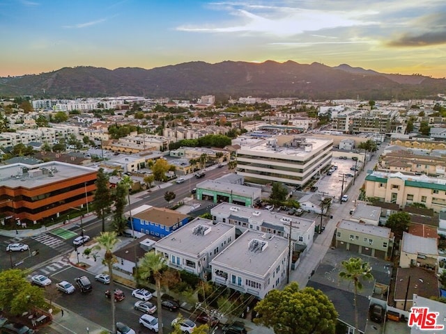 aerial view at dusk with a mountain view