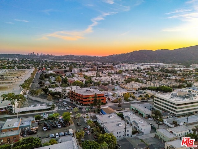 aerial view at dusk with a mountain view