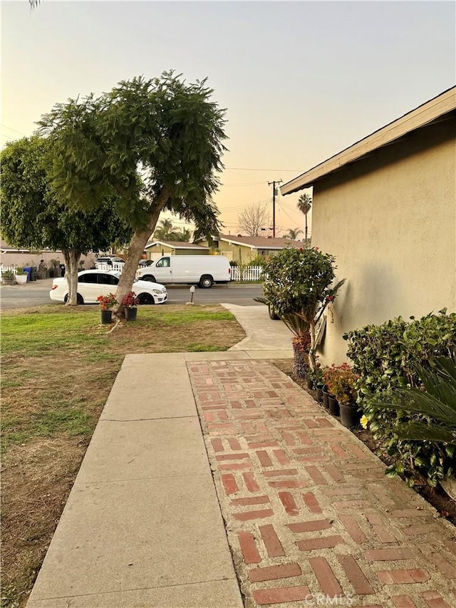 view of patio terrace at dusk