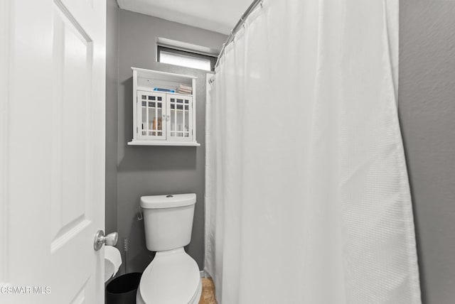 bathroom featuring toilet